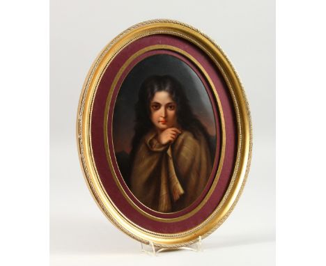 A VERY GOOD 19TH CENTURY GERMAN OVAL PORTRAIT PLAQUE of a young girl with long flowing black hair, wrapped in a cloak. 11.5in