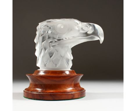 A GOOD LALIQUE GLASS "Tete d'Aigle" CAR MASCOT, with a plain glass eagle head. Etched Lalique R., France.  5.24ins long x 4.5