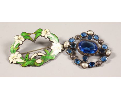 A STERLING SILVER AND ENAMEL BROOCH and A BLUE STONE &amp; MOTHER-OF-PEARL BROOCH.