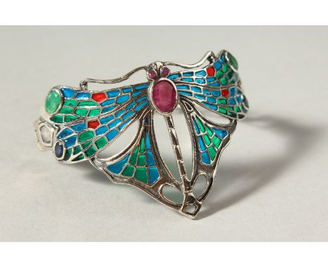 A SILVER RUBY SET EMERALD DRAGONFLY BANGLE.