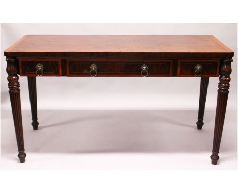 A 19TH CENTURY MAHOGANY AND SATINWOOD BANDED SERVING TABLE, with three frieze drawers having lion mask ring handles, on turne