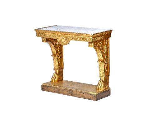 A 19th century console table, the rectangular marble inset top over a floral chased gilt base, with lion paw supports united 