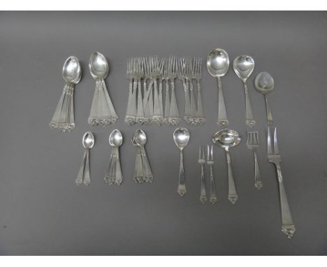 A European part table service of flatware, comprising; eighteen dessert forks, twelve dessert spoons, thirteen tea spoons, a 