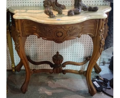 An 18th century style console table, with faux marble top on serpentine carved hardwood base, 100cm wide x 84cm high x 50cm d