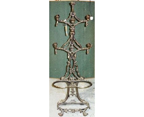 A 20th century cast iron Coalbrookdale style hall stand with five hanging hooks and twin division stick stand, (a.f), (2).  I