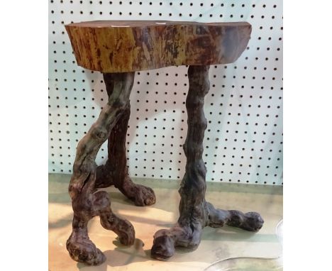 A 20th century naturalistic oak stool, 36cm wide x 46cm high.   A6