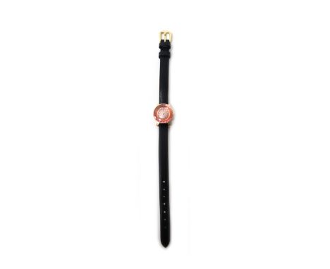 An Omega 9ct gold rear winding, circular cased lady's wristwatch, the signed circular dial with gilt baton numerals, the case