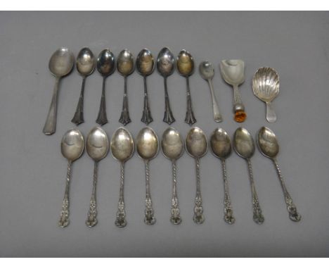 Mostly silver, comprising; a caddy spoon, with a paste set thistle terminal to the handle, Birmingham 1937, a caddy spoon, ha