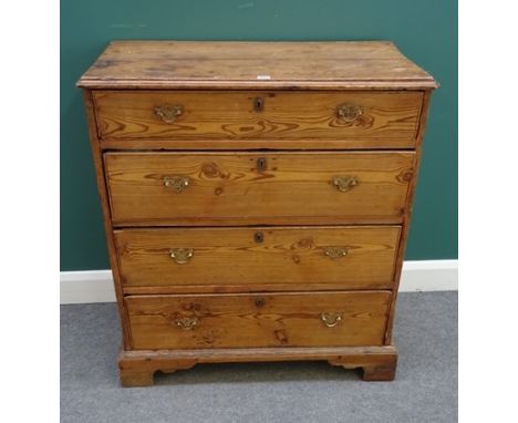 A George III pine chest of four long graduated drawers, on bracket feet, 91cm wide x 101cm high x 48cm deep.