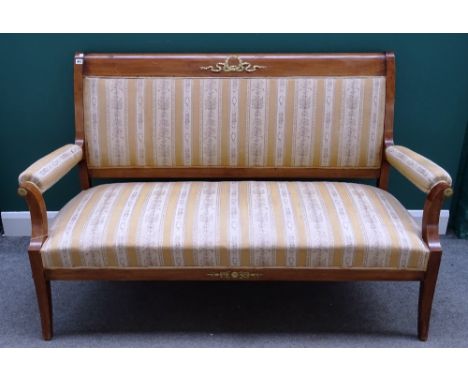 An Empire style gilt metal mounted mahogany salon suite, to comprise; a sofa (166cm wide x 103cm high), a pair of open armcha