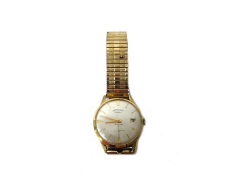 A Rotary 9ct gold circular cased gentleman's wristwatch, with a jewelled movement, the signed silvered dial with gilt baton n