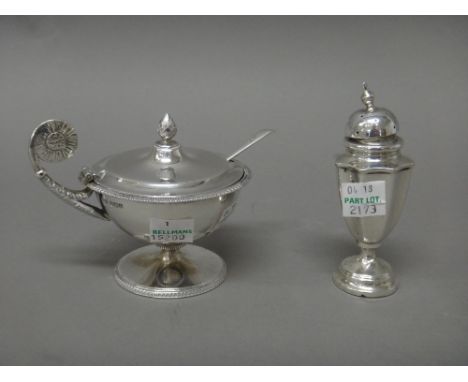 A silver hinge lidded mustard pot, of classical inspired design, with a cone finial to the lid, Sheffield 1919, with a blue g