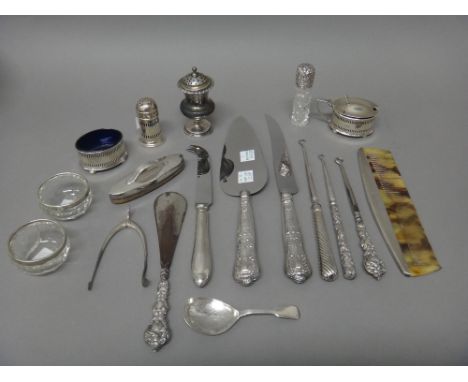 Silver and silver mounted wares, comprising; a pepperette, probably London 1833, a pair of wishbone shaped sugar nips, a fidd