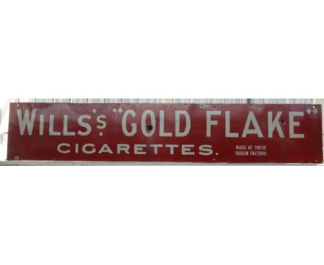 A 'Wills Gold Flake' enamel advertising sign, circa 1930, 190cm x 36cm, and one smaller Wills enamel advertising sign, 'Westw
