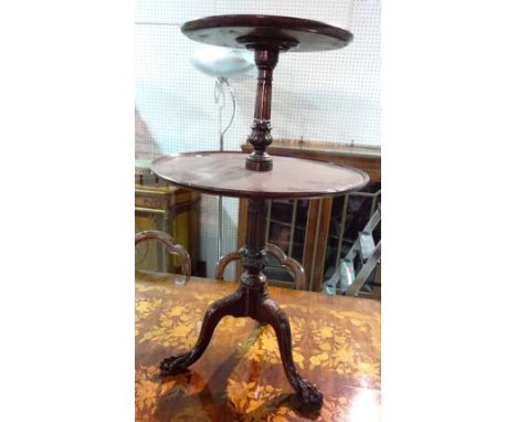 A George III mahogany graduated circular two tier dumb waiter, on tripod base, 60cm wide x 100cm high.  F9