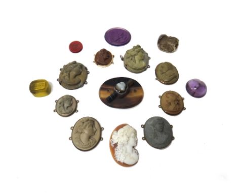 A group of six hardstones and pastes, including; a smoky quartz triple sided seal and two paste intaglios, eight lava cameos,