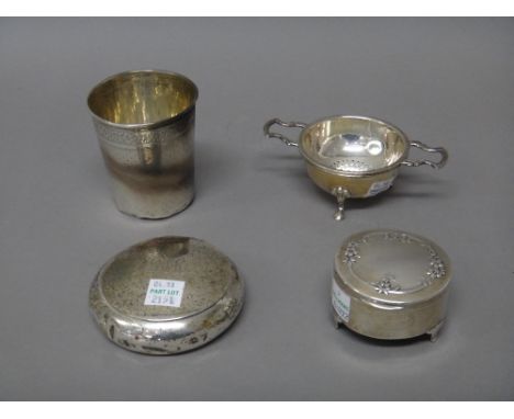 Silver and silver mounted wares, comprising; a circular tobacco box, Birmingham 1899, a twin handled tea strainer, with a sta