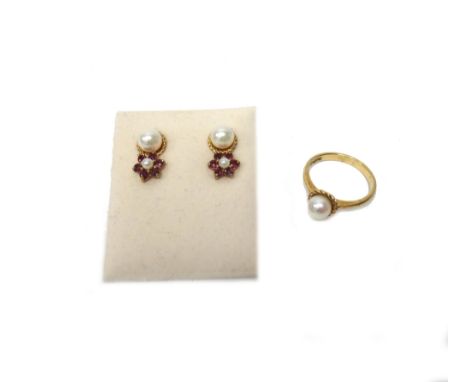 A pair of ruby and diamond cluster earstuds, the backs with post and butterfly clip fittings, a 9ct gold ring, mounted with a