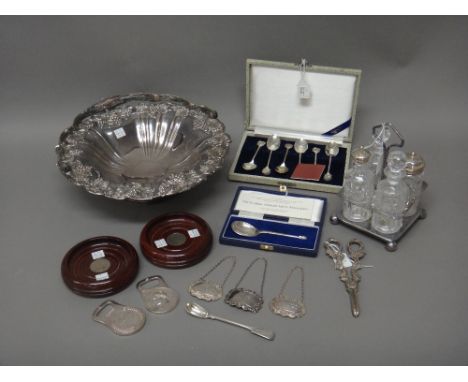 Silver, comprising; a spoon, having a fig shaped bowl and with a pine cone finial, with a case, three decanter labels, detail