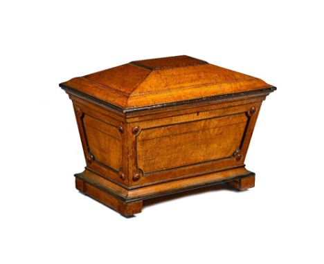 'Wilkinson & Son, 8 Old Bond Street'; an early 19th century oak sarcophagus shaped cellarette, on splayed base and block feet
