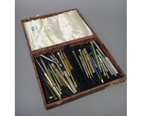 A collection of silver, gold plated, base metal and other writing implements, mostly pencils, including a silver cased pencil