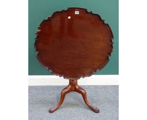 A mid-18th century marquetry occasional table, the dished pie-crust shaped top on turned column and tripod base, 72cm deep x 