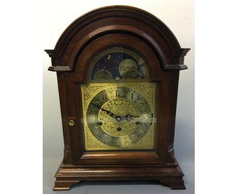 A wooden cased Baldwin astronomical mantel clock. Height 41.5cm.