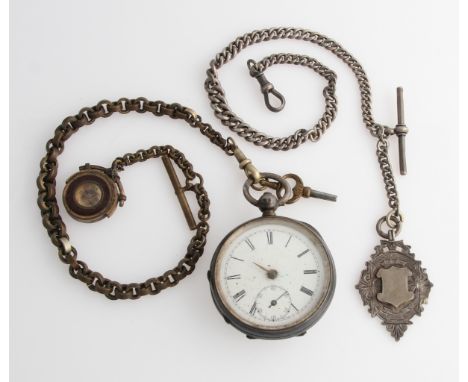 A Victorian silver open face key wind pocket watch, the white enamel dial having hourly Roman numeral markers with minute tra