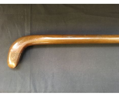 A Sunday mahogany walking stick/golf club.