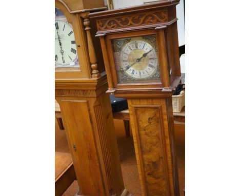 Long case walnut clock converted to a quartz movement 