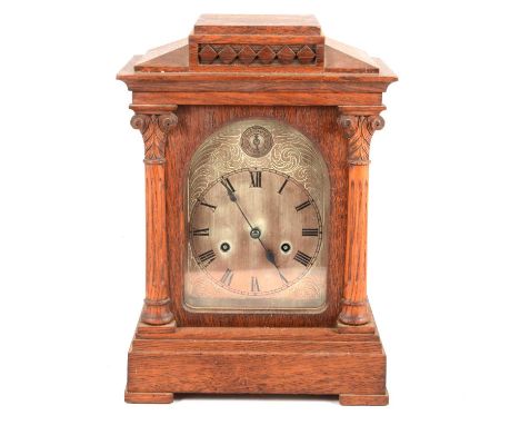 Late Victorian oak mantel clock, Continental movement striking on four gongs, 43cm, (a.f.), Victorian slate mantel clock, an 