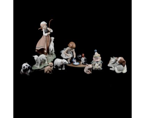 Collection of eight Lladro figurines including 'Country life' model 6964, 'Kitty's Breakfast Time' model 8498, a clown and pu