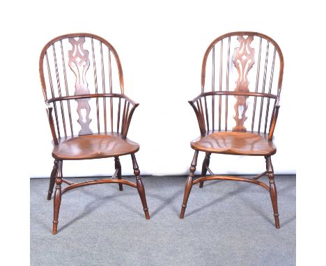 Pair of modern elm and yew wood Windsor armchairs, pierced vase backs, turned legs, with crinoline stretchers.Qty: 2Condition