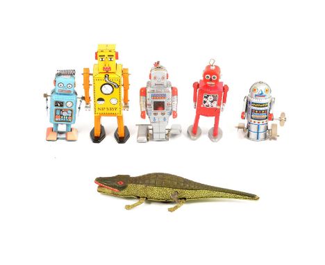 Five tin-plate clock-work retro robot toys, and a crocodile, all loose (four without keys).Qty: 6