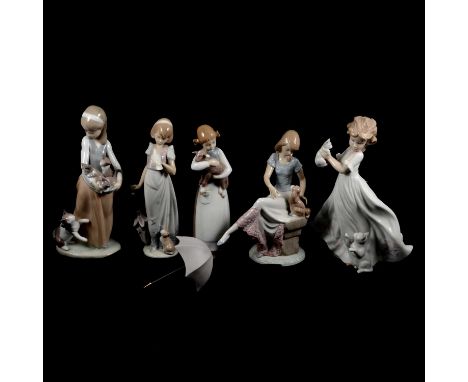 Seven Lladro figurines, including Purr-fect Friends, model 6512, 1998 Event Figure, and models 6512, 5466, 7612, 6941, 1309, 