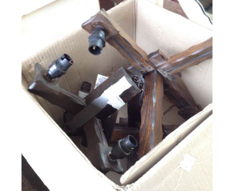 A BOX OF RUSTIC LIGHT FITTINGS