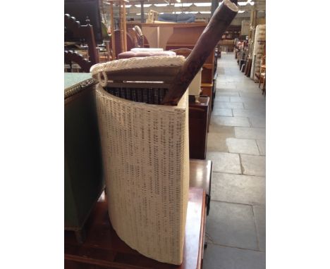 A WHITE CORNER BEDDING BOX AND AN ETHNIC CARVED STICK