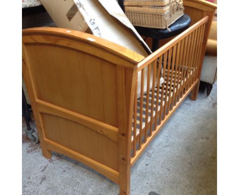 A LIGHT WOOD COT