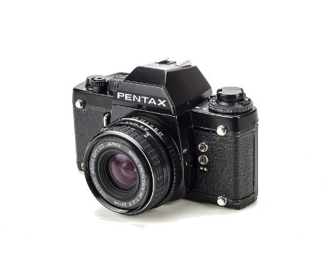 A Pentax LX SLR Camera, black, serial no. 5268995, with Pentax-M f/2.8 28mm lens, black, serial no. 7981290, body, VG, shutte