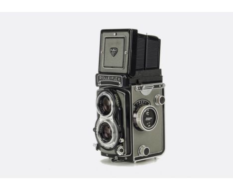 A Rolleiflex 3.5 T TLR Camera, grey, serial no. 2148736, with Carl Zeiss Tessar f/3.5 75mm lens, serial no. 2701639, body, G-