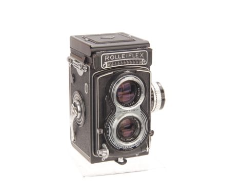 A Rolleiflex 3.5 T TLR Camera, black, serial no. T2173920, with Carl Zeiss Tessar f/3.5 75mm lens, serial no. 3572667, body, 