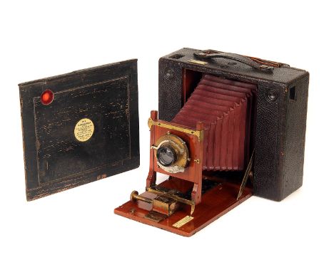 A Kodak No. 5 Cartridge Camera, serial no. 6089, with unmarked brass lens, body, G, lens, together with plate back adapter