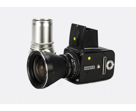 A Hasselblad 500CM Camera, black, serial no. RS1241111, with Carl Zeiss Distagon T* f/4 40mm lens, black, serial no. 6292162,