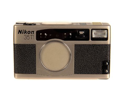 A Nikon 35Ti Compact Camera, titanium, serial no. 5024899, with Nikkor f/2.8 35mm lens, body, VG, shutter not tested, lacking