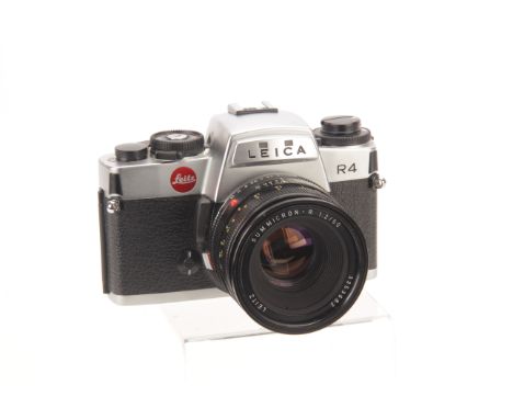 A Leica R4 SLR Camera, chrome, serial no. 1603644, with Leitz Summicron-R f/2 50mm lens, black, serial no. 3353682, body, VG,