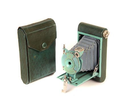 A Kodak Petite Vest Pocket Camera, green, body, G, lens, F-G, shutter working, some fungus, with instructions in maker’s case