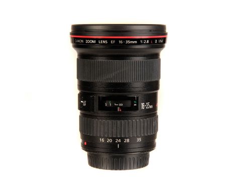 A Canon EF L II f/2.8 16-35mm Lens, black, serial no. 864829, body, VG-E, elements, VG, some light internal fungus, in maker’