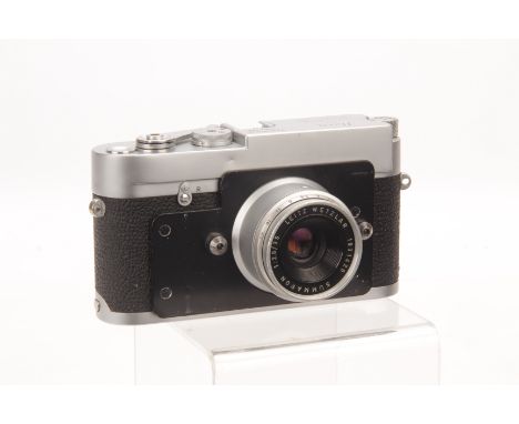 A Leica MD Post Camera, chrome, serial no. 1067994, with Leitz Summaron f/2.8 35mm lens, chrome, serial no. 1931420, body, G,