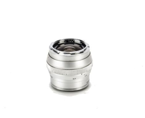 A Carl Zeiss Distagon f/2.8 25mm Lens, chrome, serial no. 3562470, body, G, elements, G-VG, some light cleaning marks to fron