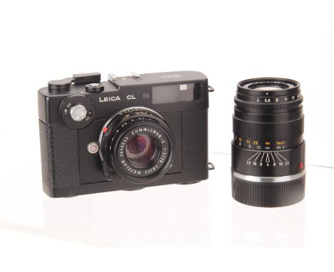 A Leica CL Rangefinder Camera, black, serial no. 1401683, with Leitz Summicron-C f/2 40mm lens, black, serial no. 2638543, bo